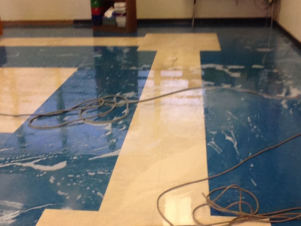 Tile cleaning in progress